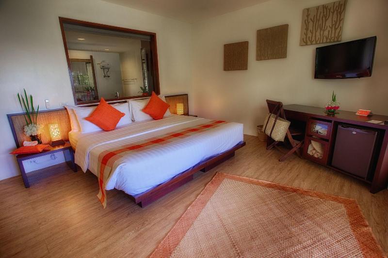 Photo of Amun Ini Beach Resort & Spa, 4-star hotel in Anda