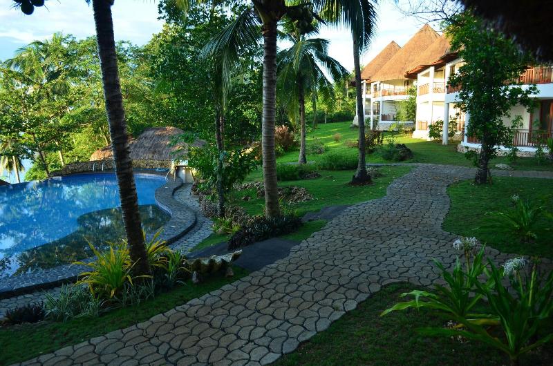 Photo of Amun Ini Beach Resort & Spa, 4-star hotel in Anda
