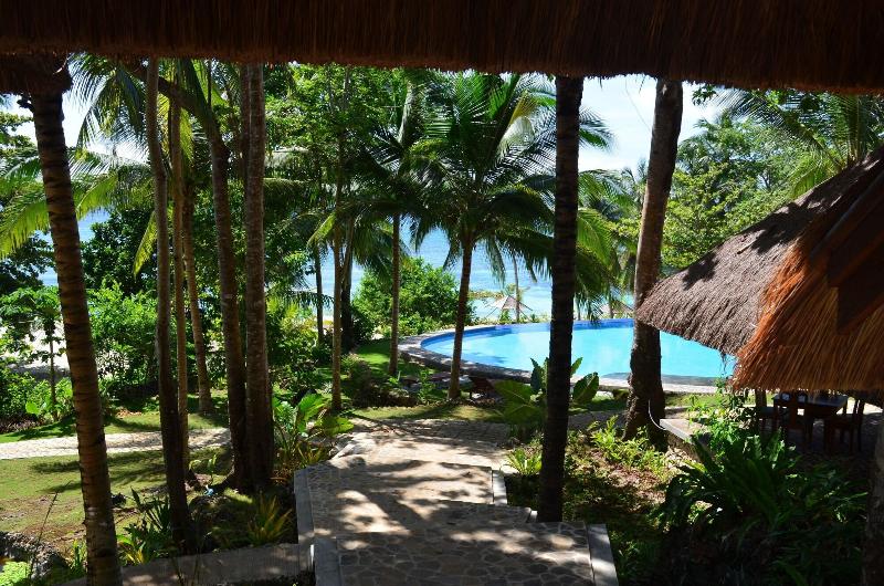 Photo of Amun Ini Beach Resort & Spa, 4-star hotel in Anda