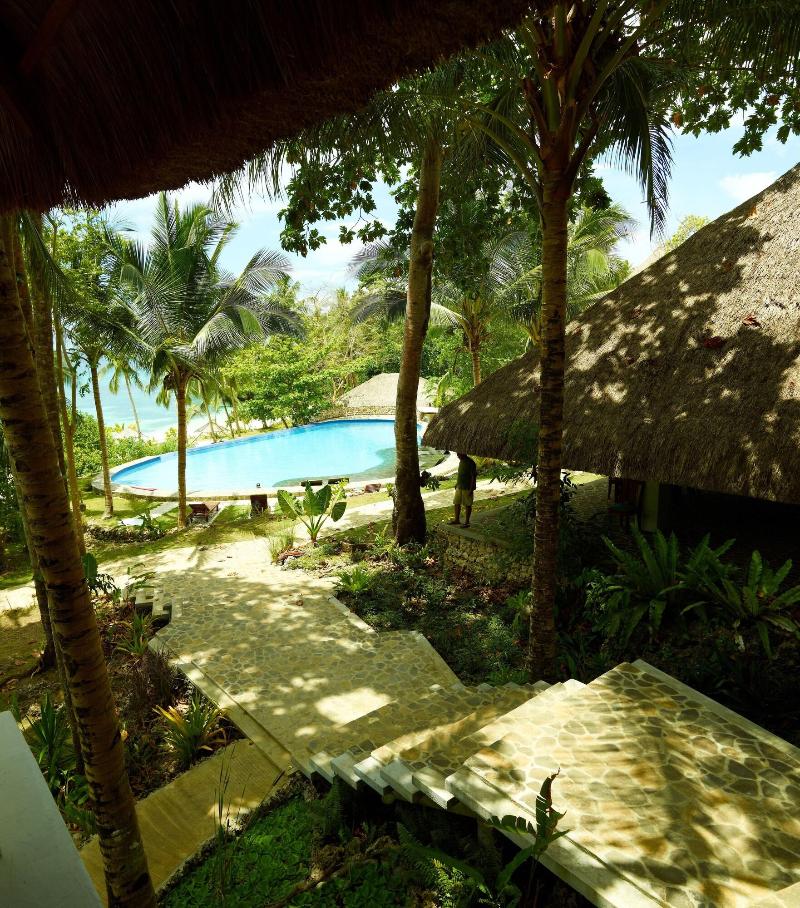 Photo of Amun Ini Beach Resort & Spa, 4-star hotel in Anda