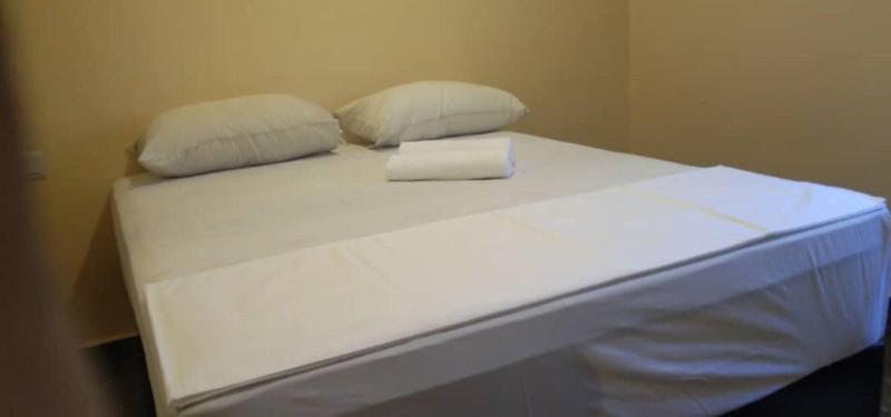 Photo of OYO 90445 Th Hotel, 2-star hotel in Bahau