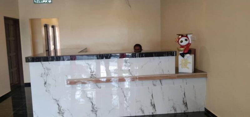 Photo of OYO 90445 Th Hotel, 2-star hotel in Bahau