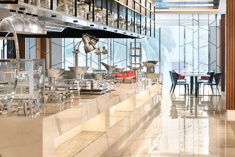 Photo of Asiana Grand Hotel, 5-star hotel in Al Muraqqabat