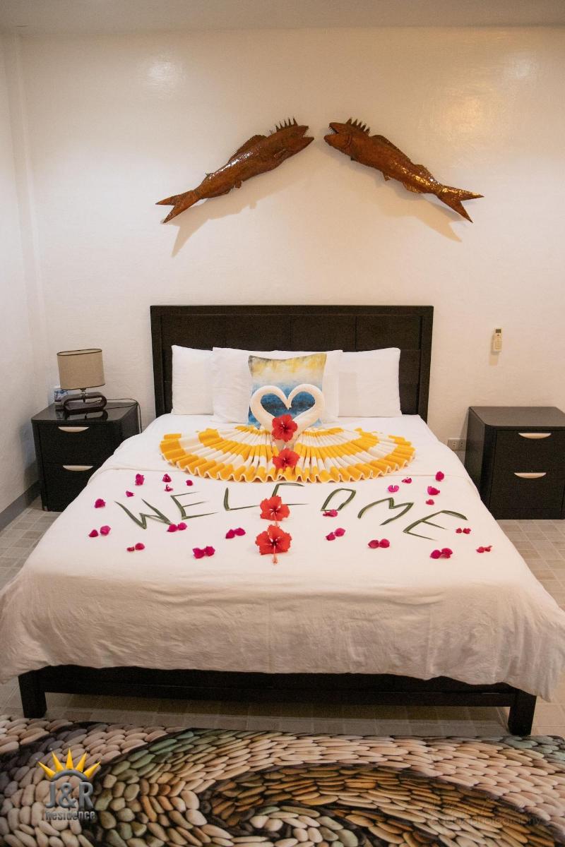 Photo of J&R Residence, 3-star hotel in Anda