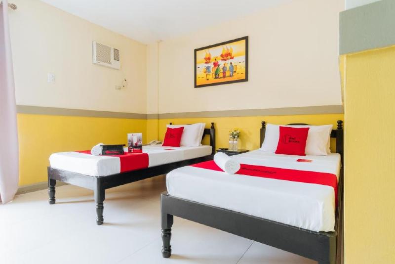 Photo of RedDoorz Premium @ THE GRAND PENINSULA SUITES, 4-star hotel in Balanga