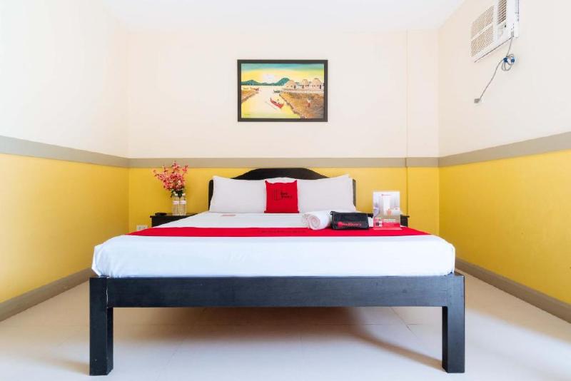 Photo of RedDoorz Premium @ THE GRAND PENINSULA SUITES, 4-star hotel in Balanga