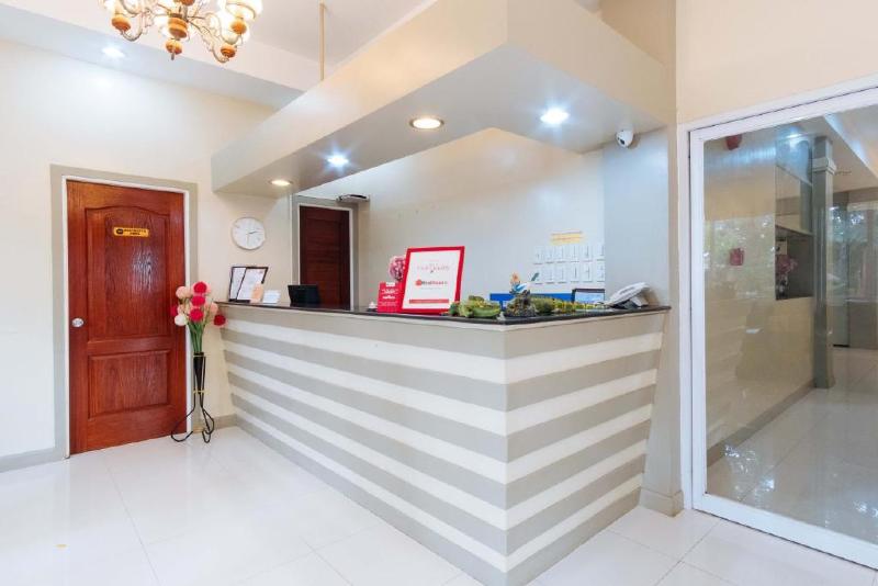 Photo of RedDoorz Premium @ THE GRAND PENINSULA SUITES, 4-star hotel in Balanga