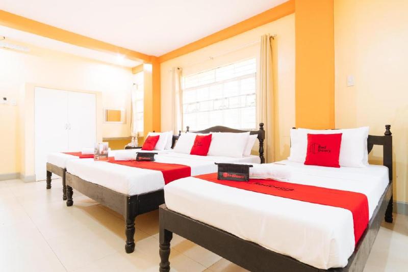 Photo of RedDoorz Premium @ THE GRAND PENINSULA SUITES, 4-star hotel in Balanga