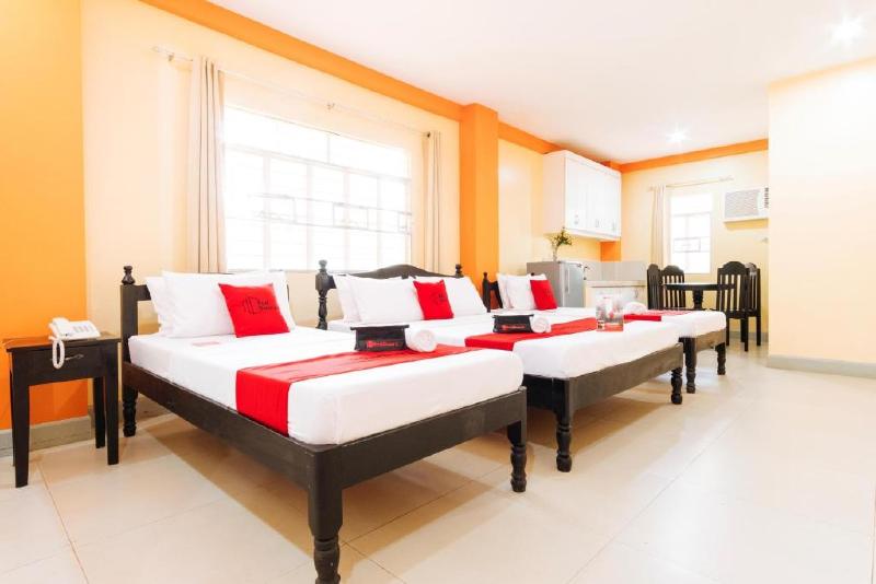 Photo of RedDoorz Premium @ THE GRAND PENINSULA SUITES, 4-star hotel in Balanga