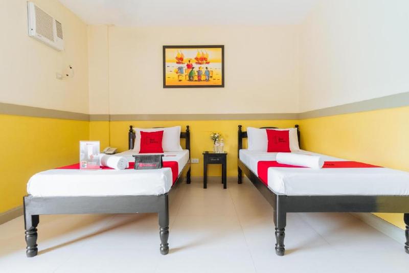 Photo of RedDoorz Premium @ THE GRAND PENINSULA SUITES, 4-star hotel in Balanga