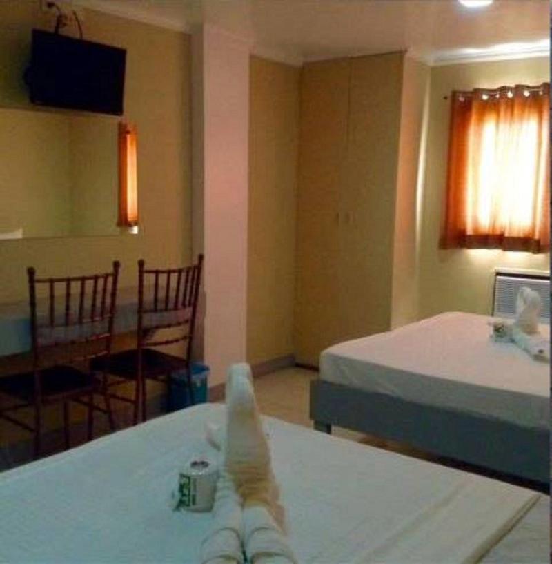 Photo of UKL Ever Resort Hotel, 2-star hotel in Laoag