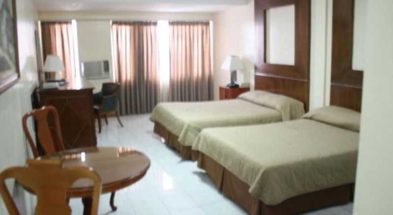 Photo of Garden Plaza Hotel, 3-star hotel in Ermita