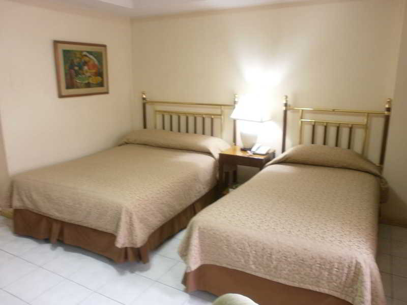 Photo of Garden Plaza Hotel, 3-star hotel in Ermita