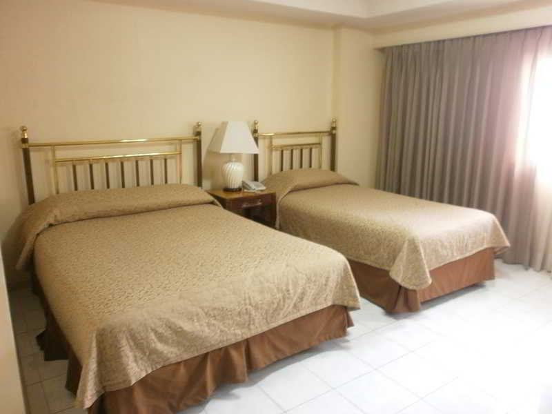 Photo of Garden Plaza Hotel, 3-star hotel in Ermita
