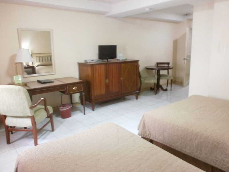 Photo of Garden Plaza Hotel, 3-star hotel in Ermita