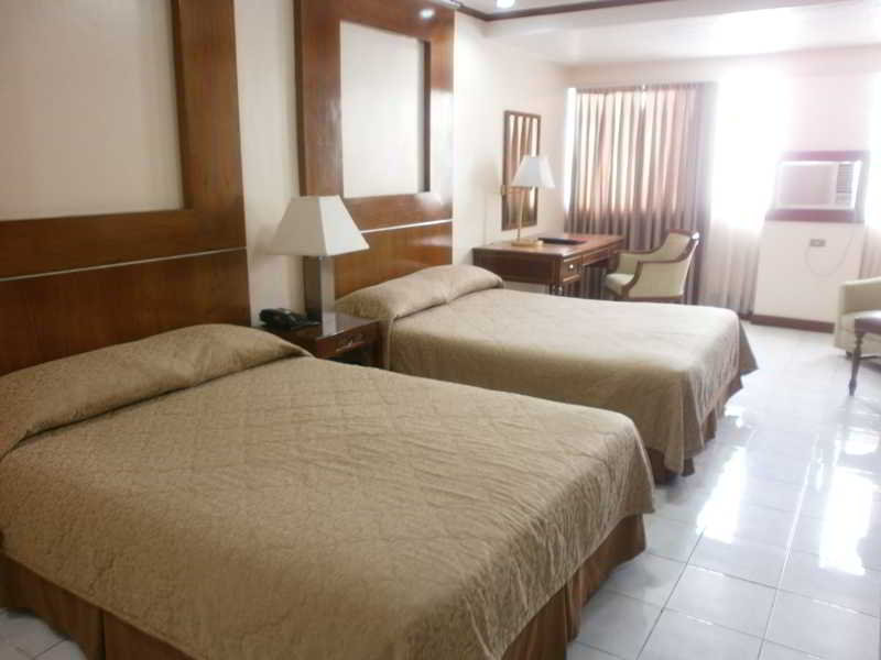 Photo of Garden Plaza Hotel, 3-star hotel in Ermita