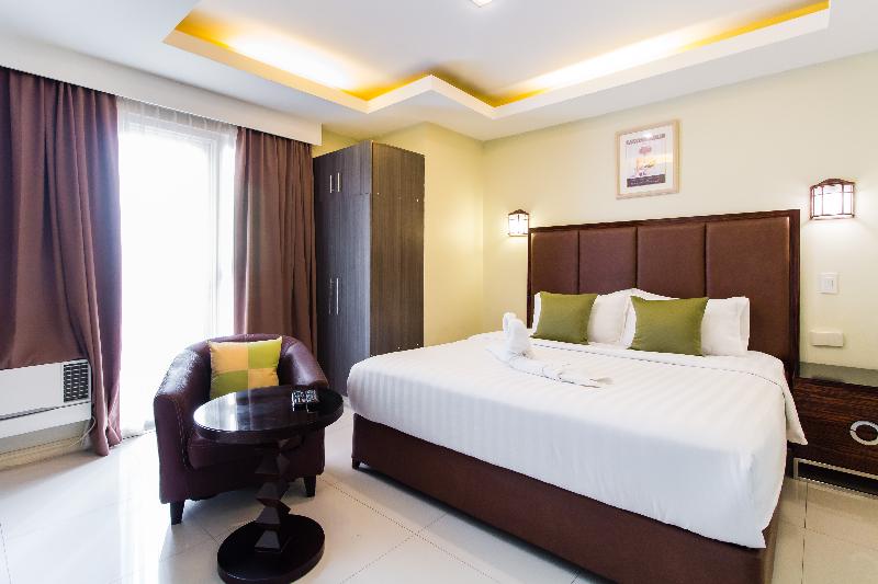 Photo of JMM Grand Suites, 3-star hotel in Ermita