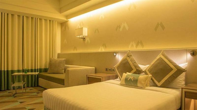 Photo of Hotel Benilde Maison De La Salle, 4-star hotel in Manila (and vicinity)