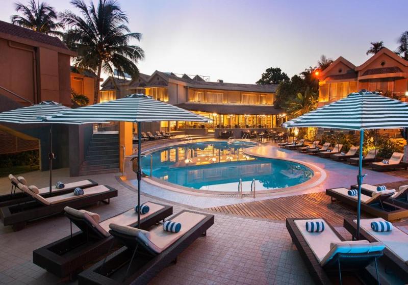 Photo of Whispering Palms Beach Resort, 4-star hotel in Candolim