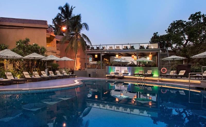 Photo of Whispering Palms Beach Resort, 4-star hotel in Candolim