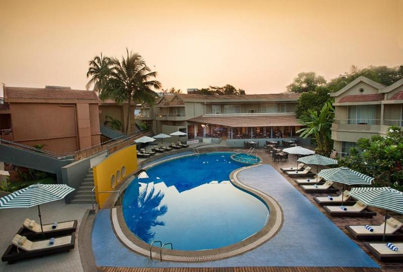 Photo of Whispering Palms Beach Resort, 4-star hotel in Candolim