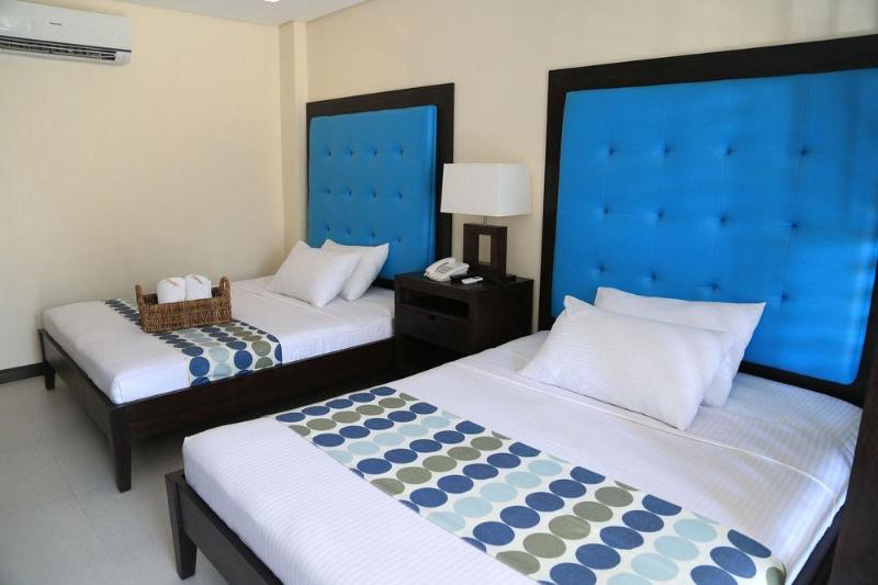 Photo of Puerto Del Sol Beach Resort, 4-star hotel in Bolinao