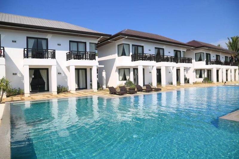 Photo of Puerto Del Sol Beach Resort, 4-star hotel in Bolinao