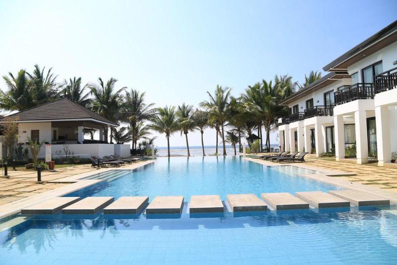 Photo of Puerto Del Sol Beach Resort, 4-star hotel in Bolinao