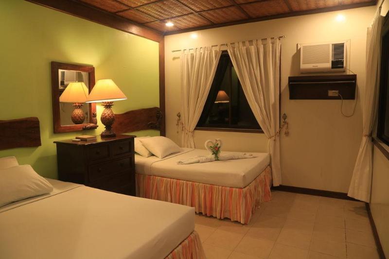 Photo of Puerto Del Sol Beach Resort, 4-star hotel in Bolinao