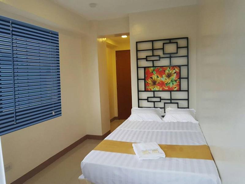 Photo of Bakasyunan Inn Laoag, 3-star hotel in Laoag