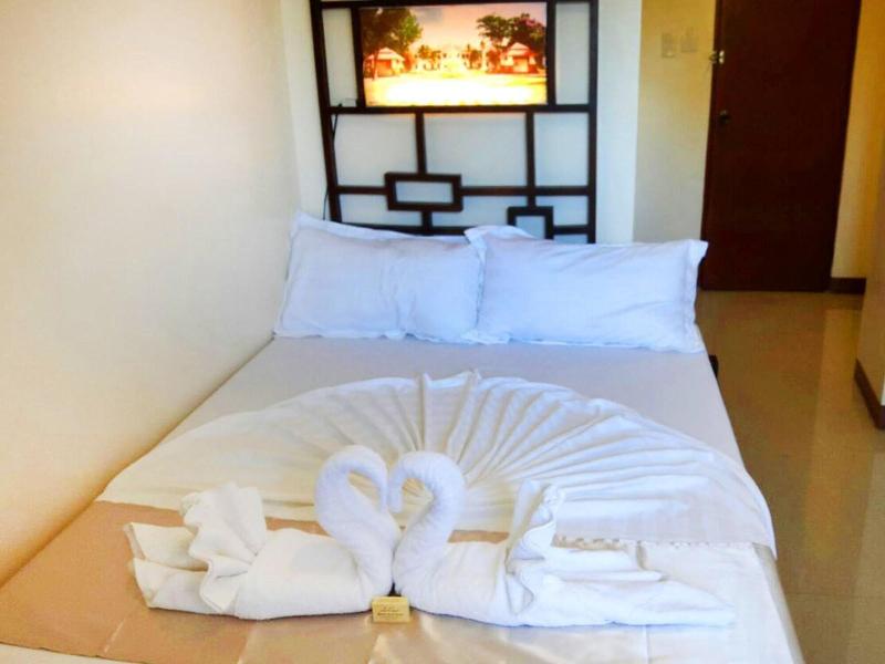 Photo of Bakasyunan Inn Laoag, 3-star hotel in Laoag