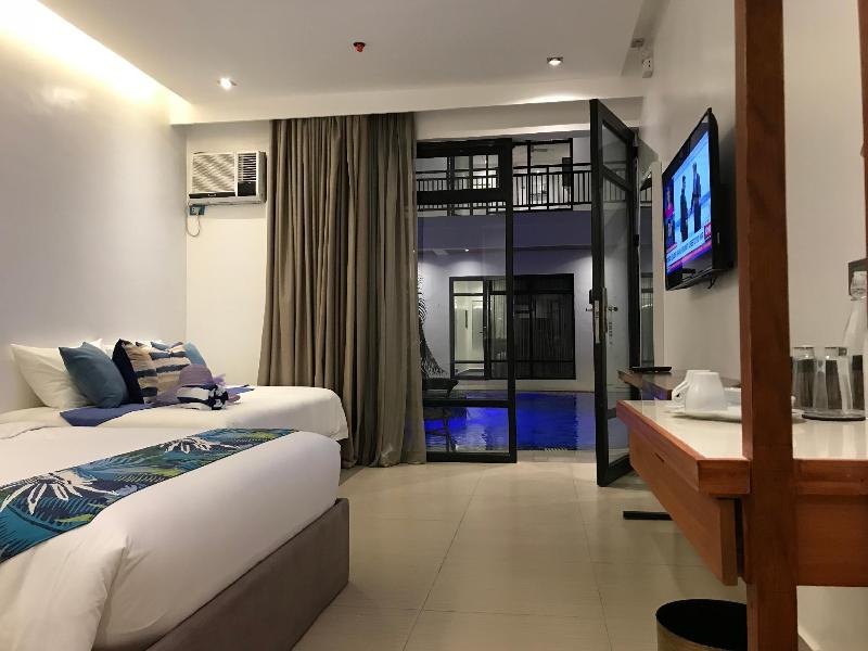 Photo of White Breeze Palawan Boutique Hotel, 4-star hotel in Palawan (province)